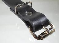 A heel bar roller buckle on a strap.